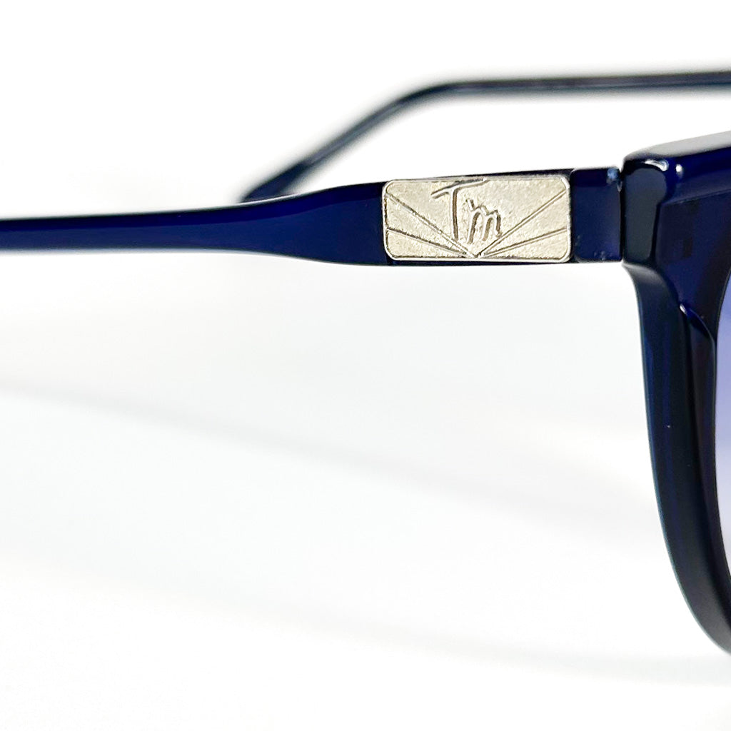 Monture lunettes vintage beu modèle T.m, détail logo métal sur branche
