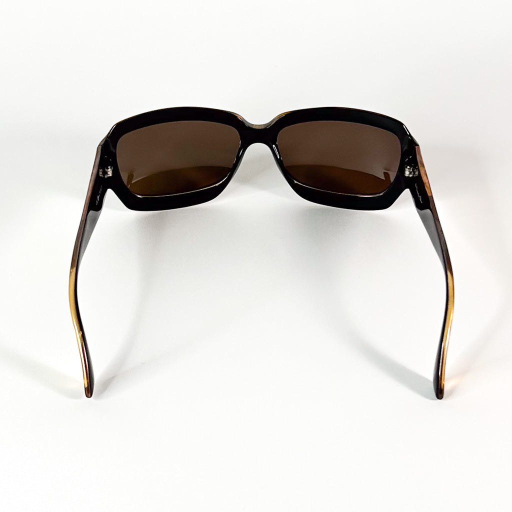 Profil latéral gauche des lunettes Dior vintage avec logo CD doré