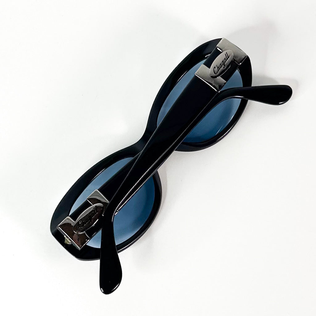 Lunettes vintage Chagall vue détaillée des branches en acétate noir avec logo métal