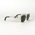 Vue de 3/4 des lunettes Philipp Plein – monture dorée et structure en double pont