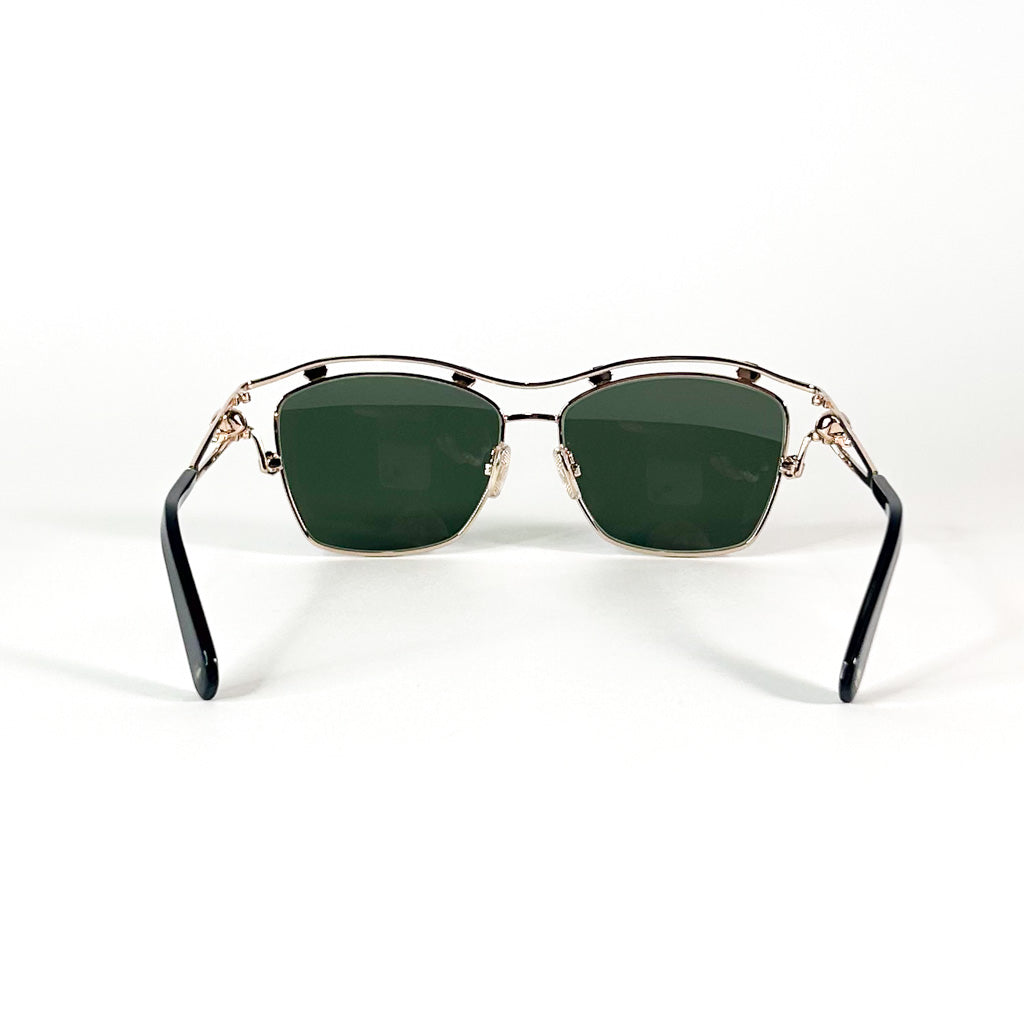 Vue arrière des lunettes Philipp Plein – verres verts et branches fines noires