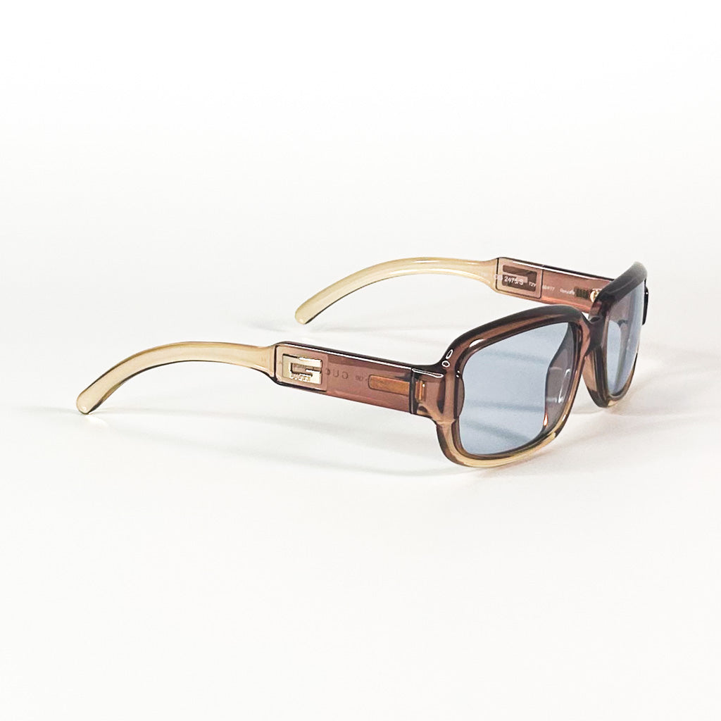 Lunettes Gucci GG 2475/S vues de dessus, branches croisées