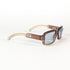 Lunettes Gucci GG 2475/S vues de dessus, branches croisées