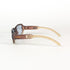 Lunettes Gucci GG 2475/S vues de dessus, branches croisées