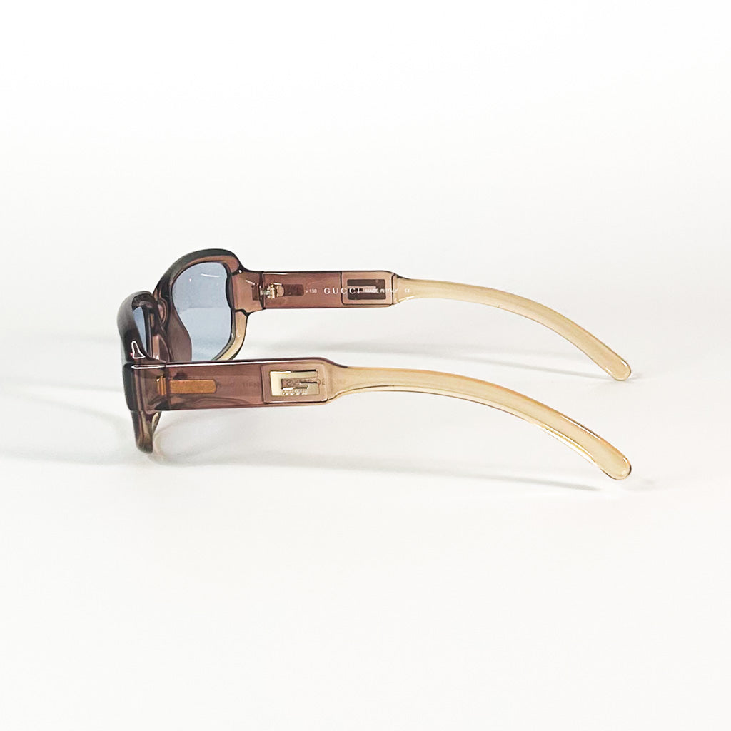 Lunettes Gucci GG 2475/S vues de dessus, branches croisées