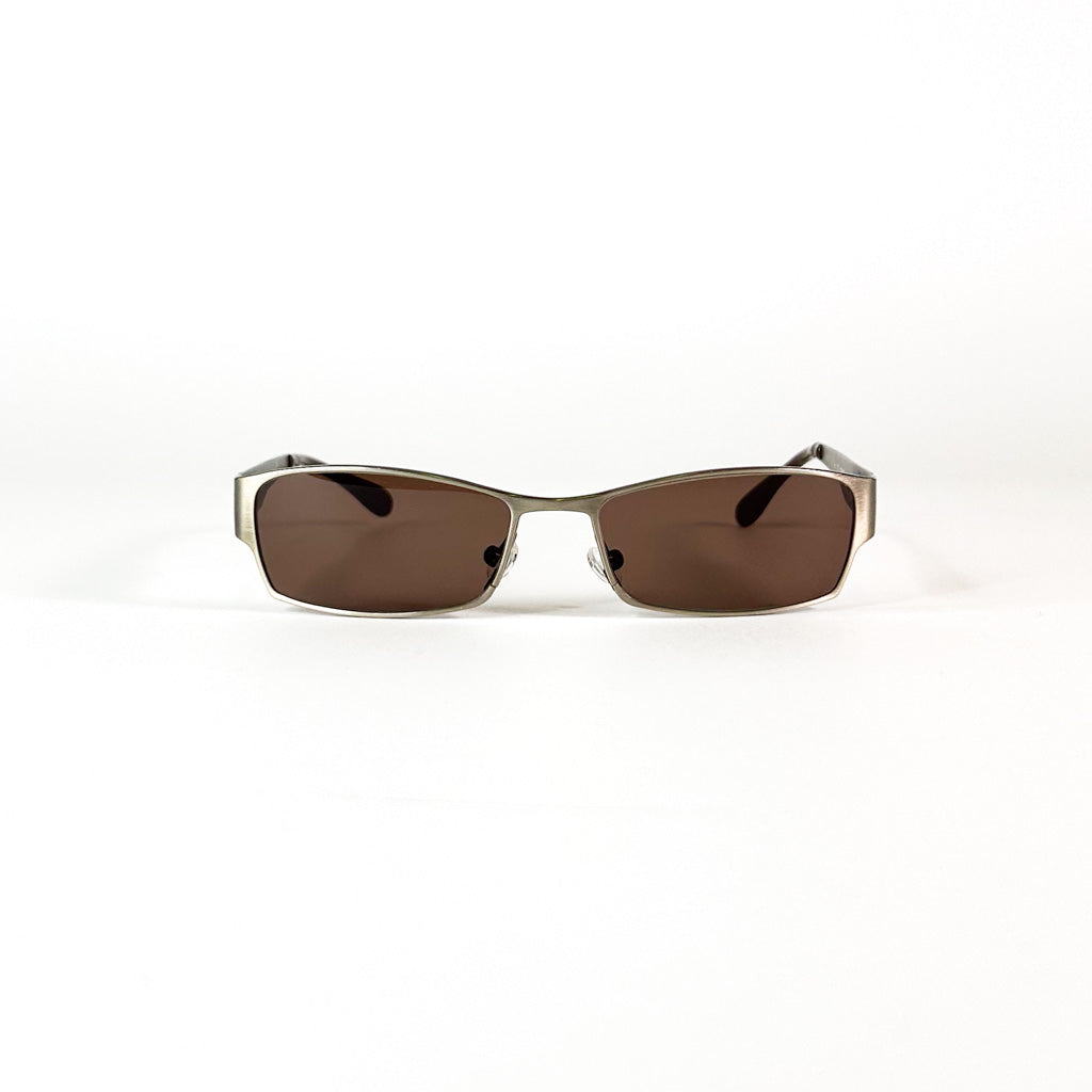 Vue de face d’une paire de lunettes Yves Saint Laurent 2080/S en métal brossé avec verres bruns sur fond blanc