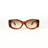 vue de face d’une paire de lunettes solaires vintage écaille avec verres dégradés bruns sur fond blanc