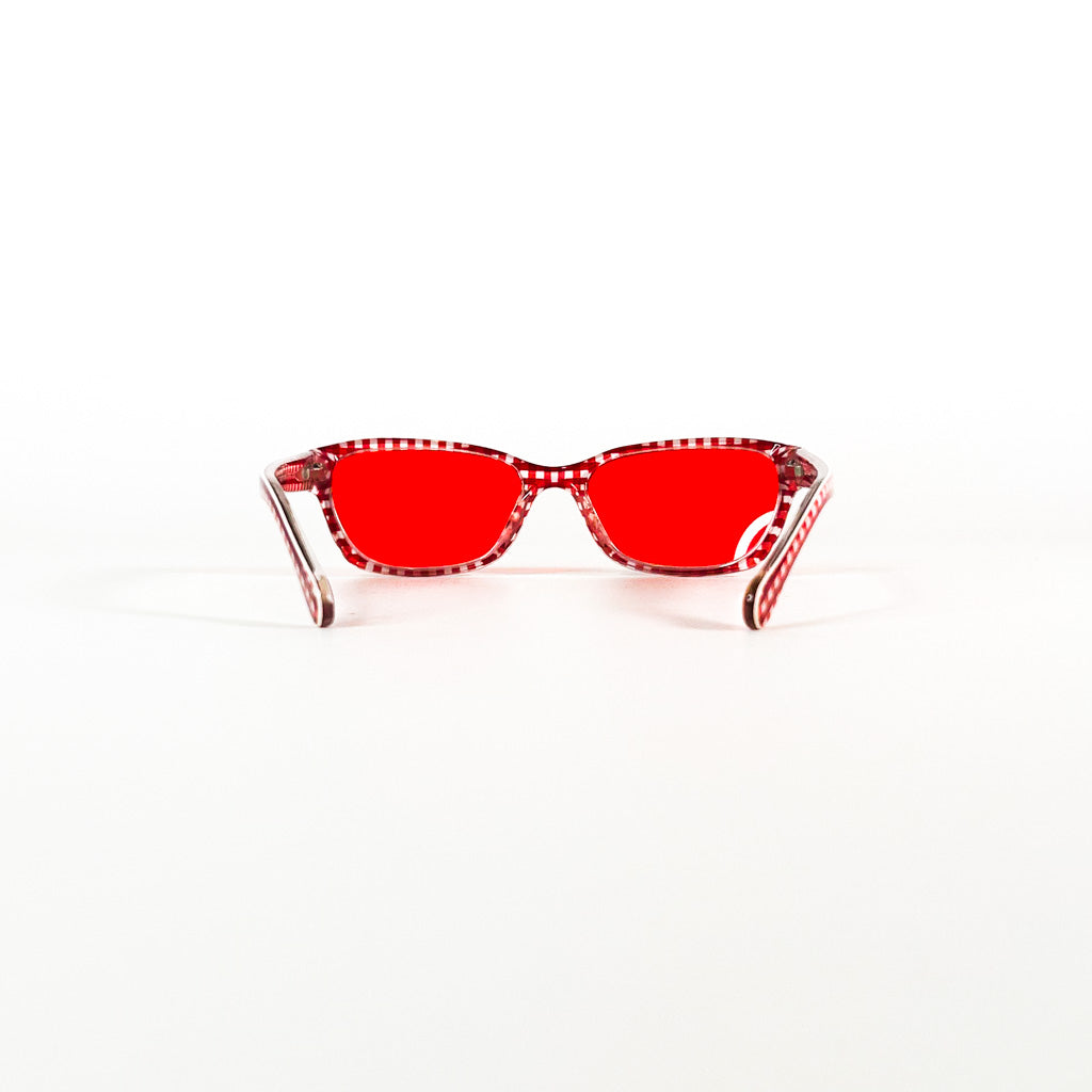 Vue 3/4 de la monture D&G DG 1216 avec verres teintés rouge