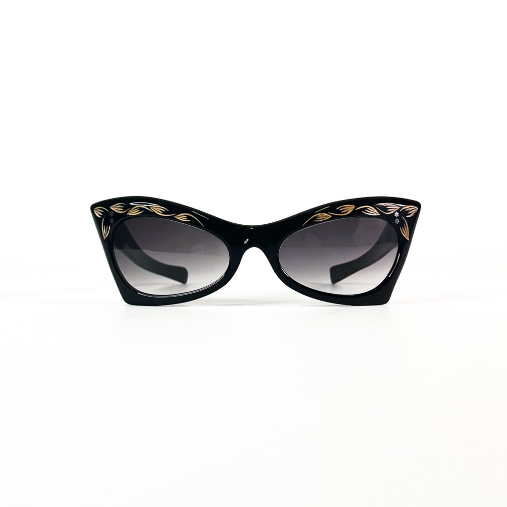 Lunettes vintage cat-eye noires vues de face – décor doré étoilé