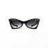 Lunettes vintage cat-eye noires vues de face – décor doré étoilé