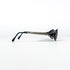 Lunettes de soleil Dolce Vita DVS-11 posées sur un tissu, vue latérale avec reflet sur les verres