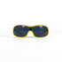 Lunettes Nouvelle Vague Rapid S109 posées à plat, vue en plongée sur la face dorée et les verres noirs