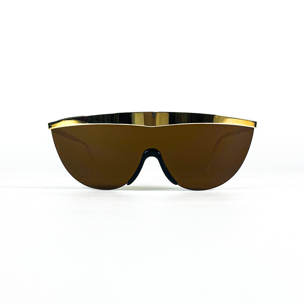 Lunettes de soleil Nouvelle Vague Sally P1 – vue perspective, style visor shield futuriste, monoverre teinté brun, design italien haut de gamme années 2000