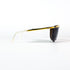 Lunettes de soleil Nouvelle Vague Sally P1 – vue frontale, barre supérieure dorée, verre unique teinté brun, design neuf collection années 2000