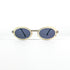 Lunettes Courrèges G100 vue de face sur fond blanc monture métal et coque ivoire