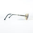 Branchés flexibles et embouts noirs des lunettes de soleil Courrèges G100