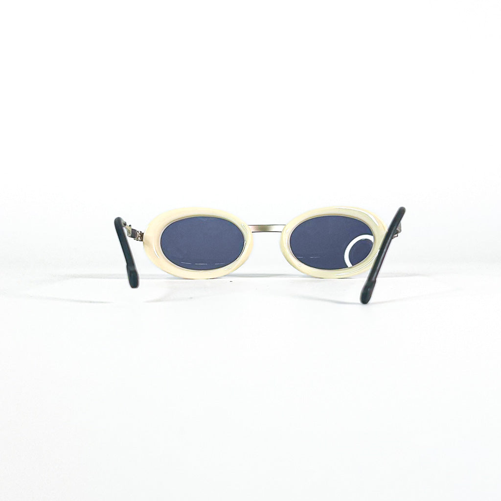Lunettes Courrèges C9841 G100 vue de face monture ivoire et verres teintés