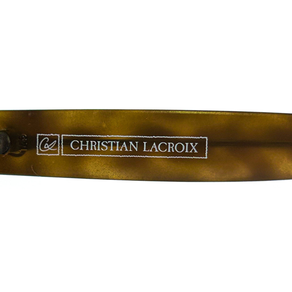 Logo Christian Lacroix sérigraphié sur la branche intérieure d’une monture vintage 7318