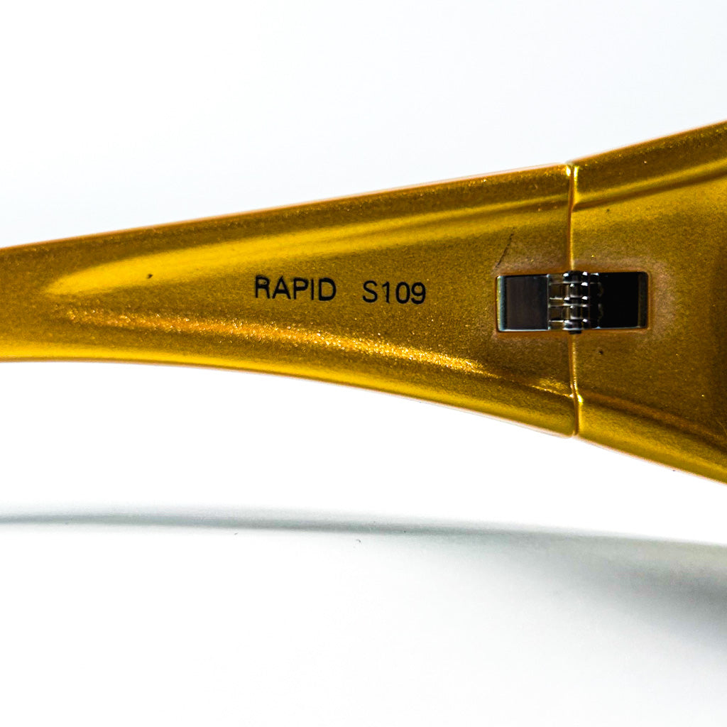 Profil gauche des lunettes Nouvelle Vague Rapid S109, monture dorée et forme enveloppante