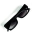 Lunettes YSL vintage noires pliées vues de dessus