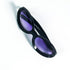 lunettes vintage ovales noires verres violets devant fermée