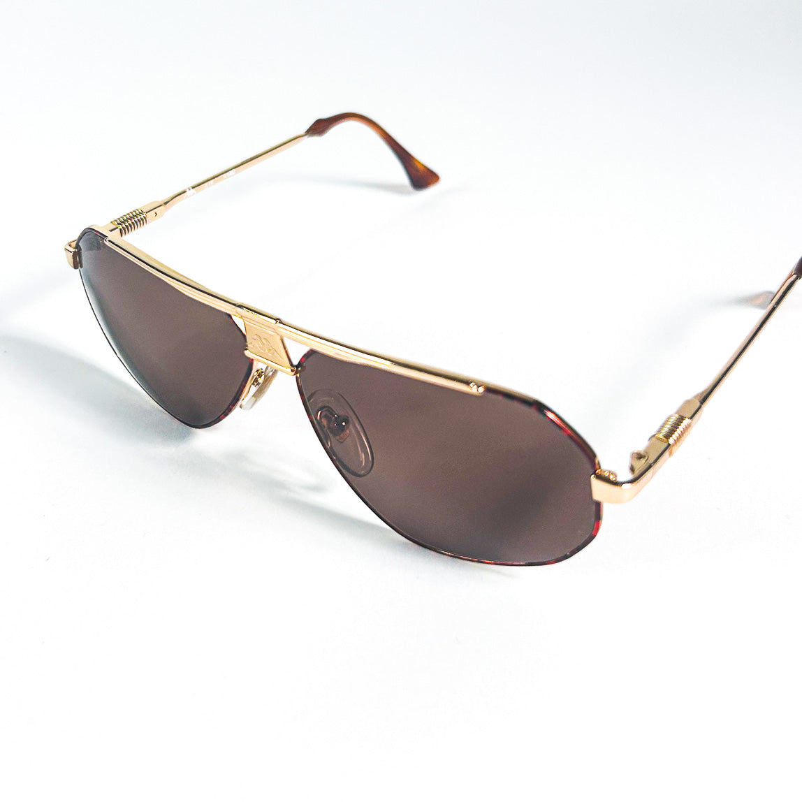 Lunettes Kappa 250 dorées avec verres marron foncé, logo visible