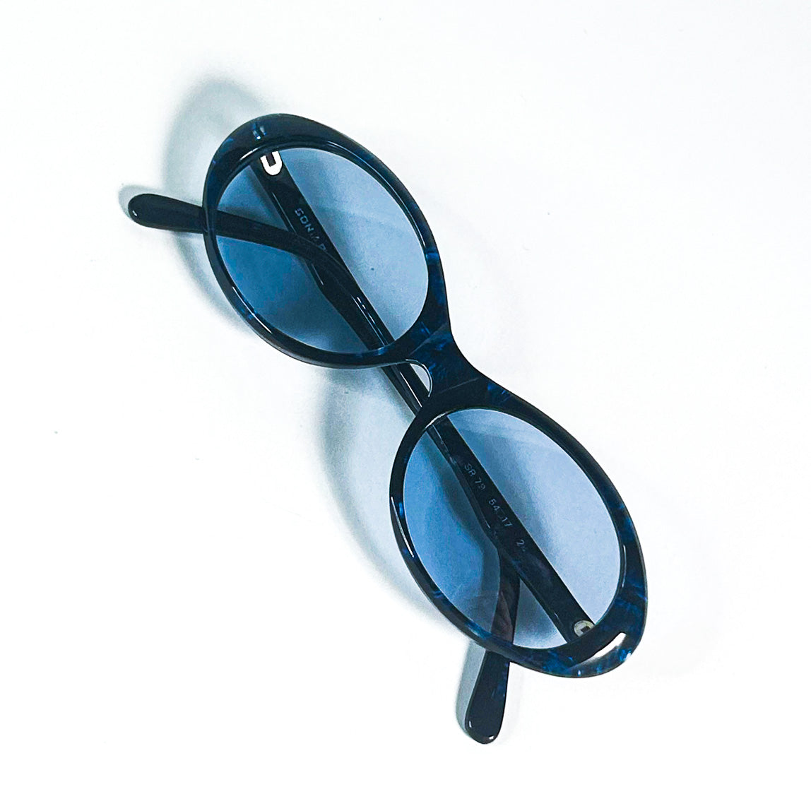 Lunettes ovales Sonia Rykiel en acétate bleu – vue à plat