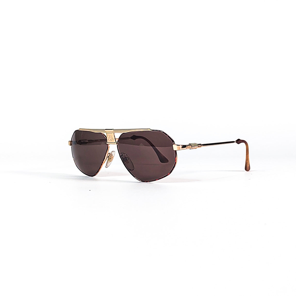Vue oblique des lunettes Kappa 250 vintage avec double pont et logo Kappa