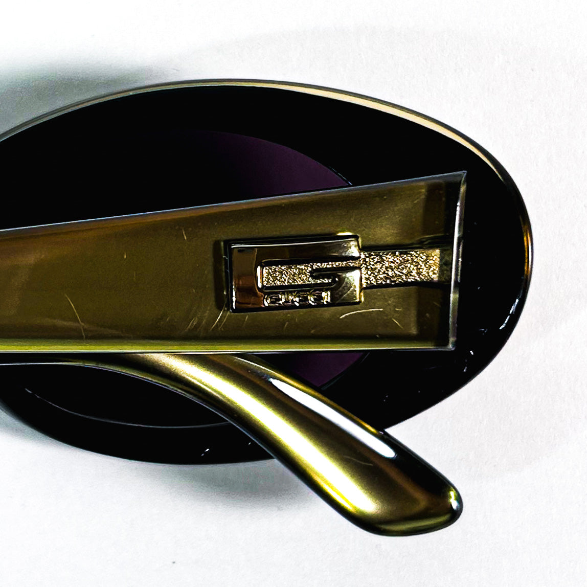 lunettes Gucci GG 2438/S vue du dessus légèrement repliées