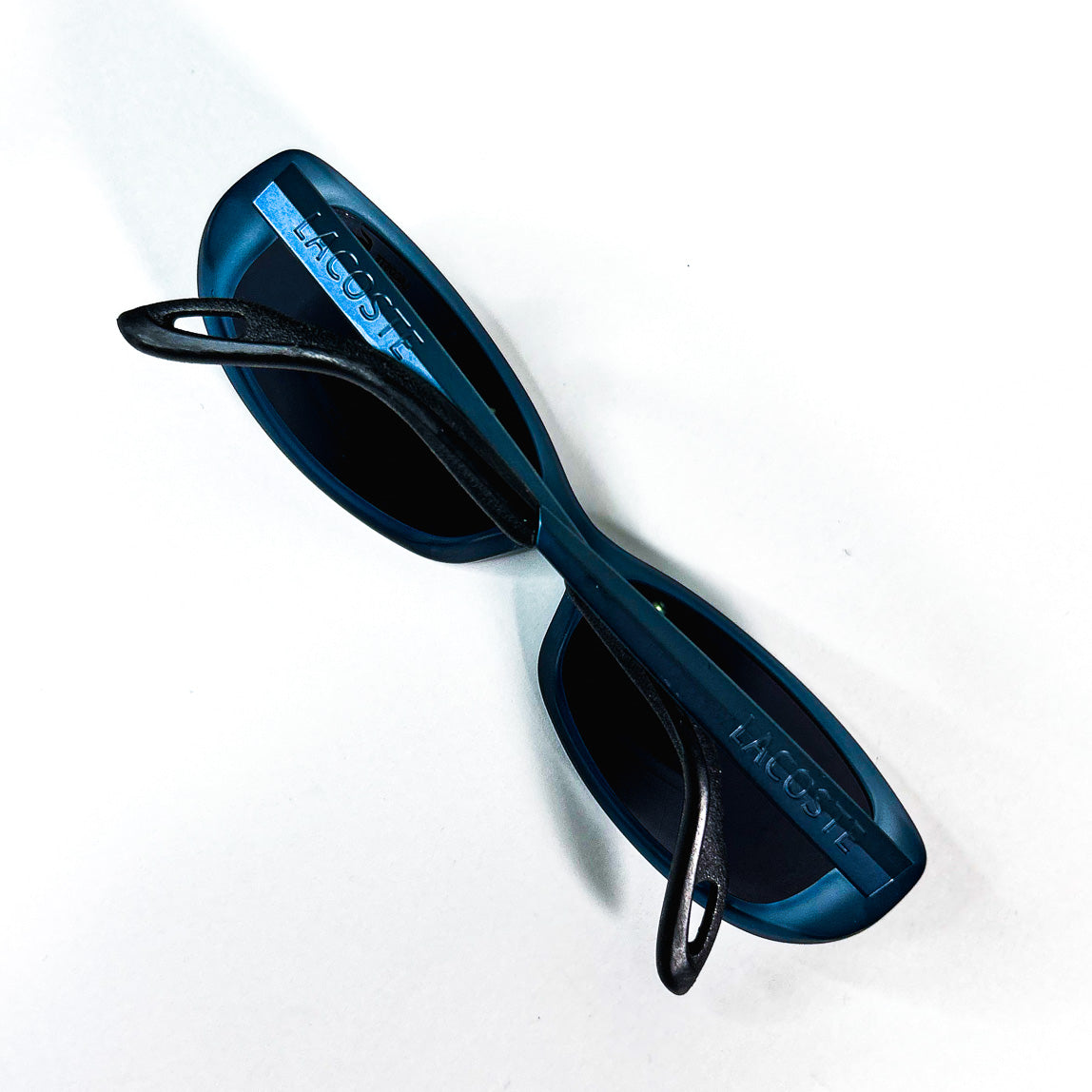 Lunettes Lacoste SPORT 1524 pliées avec logo visible