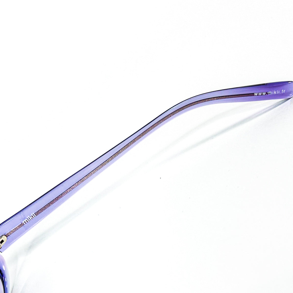 Logo Mikli sur branche lunettes violettes