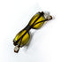 lunettes vintage pliées damier noir blanc verres jaunes vue en biais