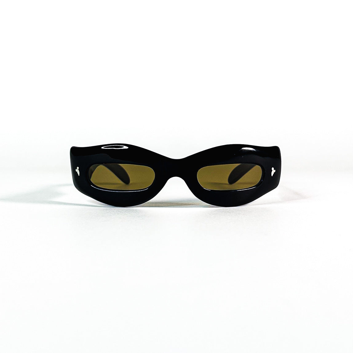 Face avant des lunettes Lozza ovales noires à verres ambrés