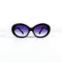 Vue face neutre, monture noire ovale verres violets