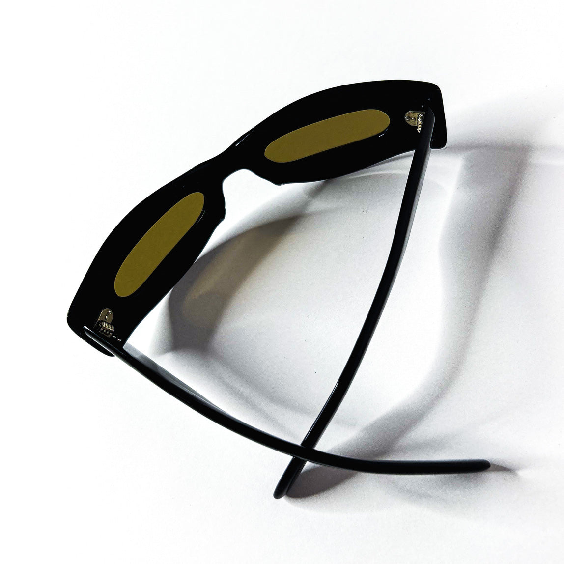 Lunettes Lozza vintage ovales noires vues de dos, branches croisées