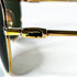 logo crocodile vert émaillé sur branche lunettes Lacoste 101 Gold