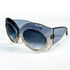 Face 3/4 lunettes Givenchy oversize gris translucide