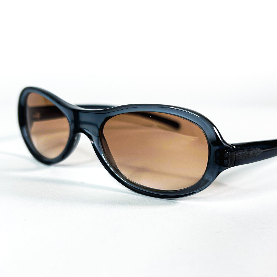 Vue de trois quarts lunettes Prada SPR 04A 2AD-1A1 ovales