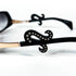 Détail branches lunettes Miki M0165 strassées noires et dorées