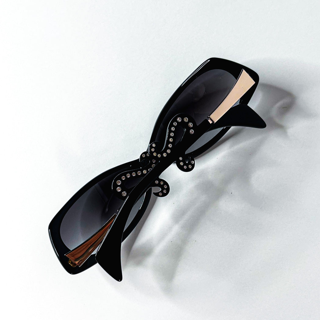 Lunettes Miki M0165 noires ovales avec branches strassées dorées
