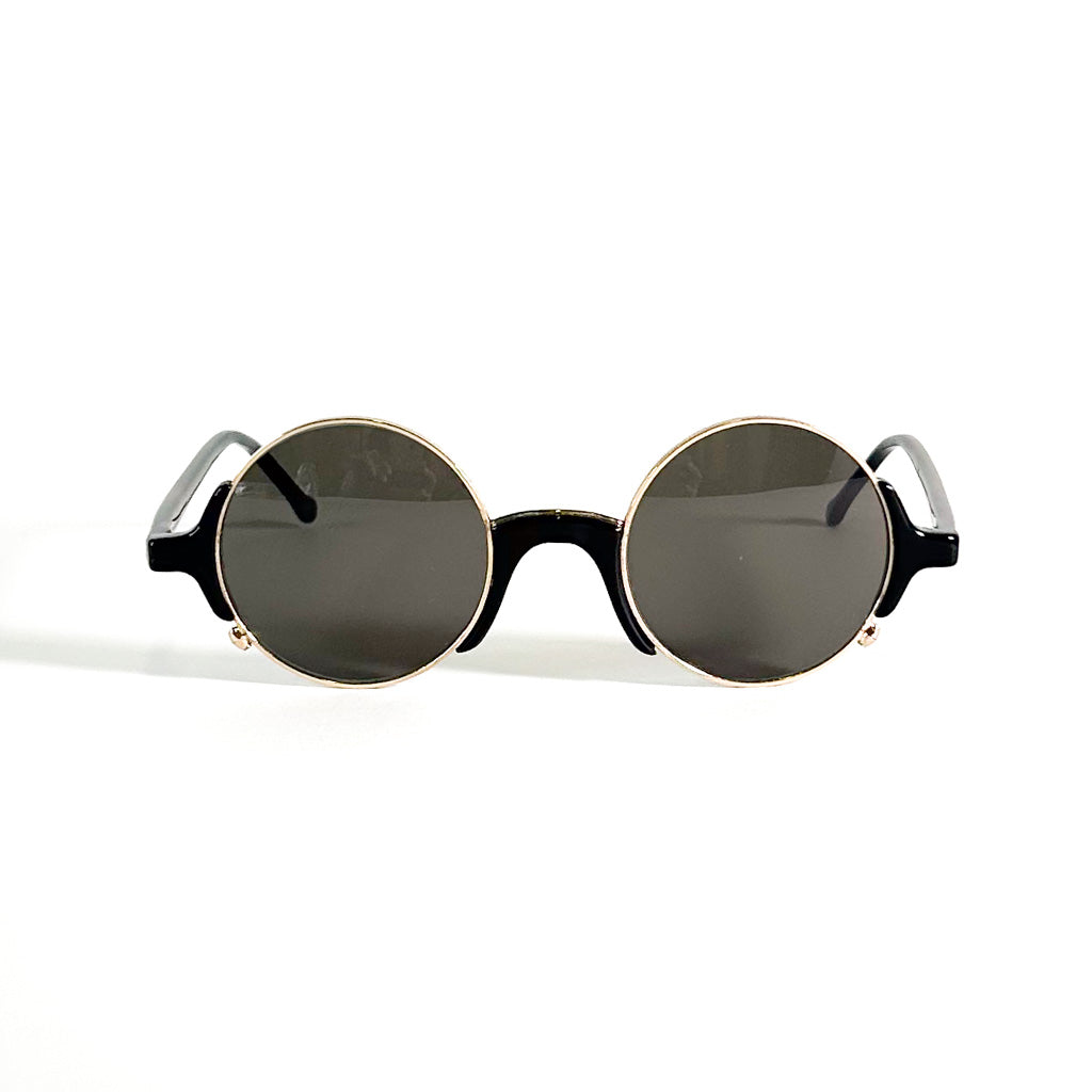 Lunettes Giorgio Armani monture ronde noire et cerclage métallique doré vue de face