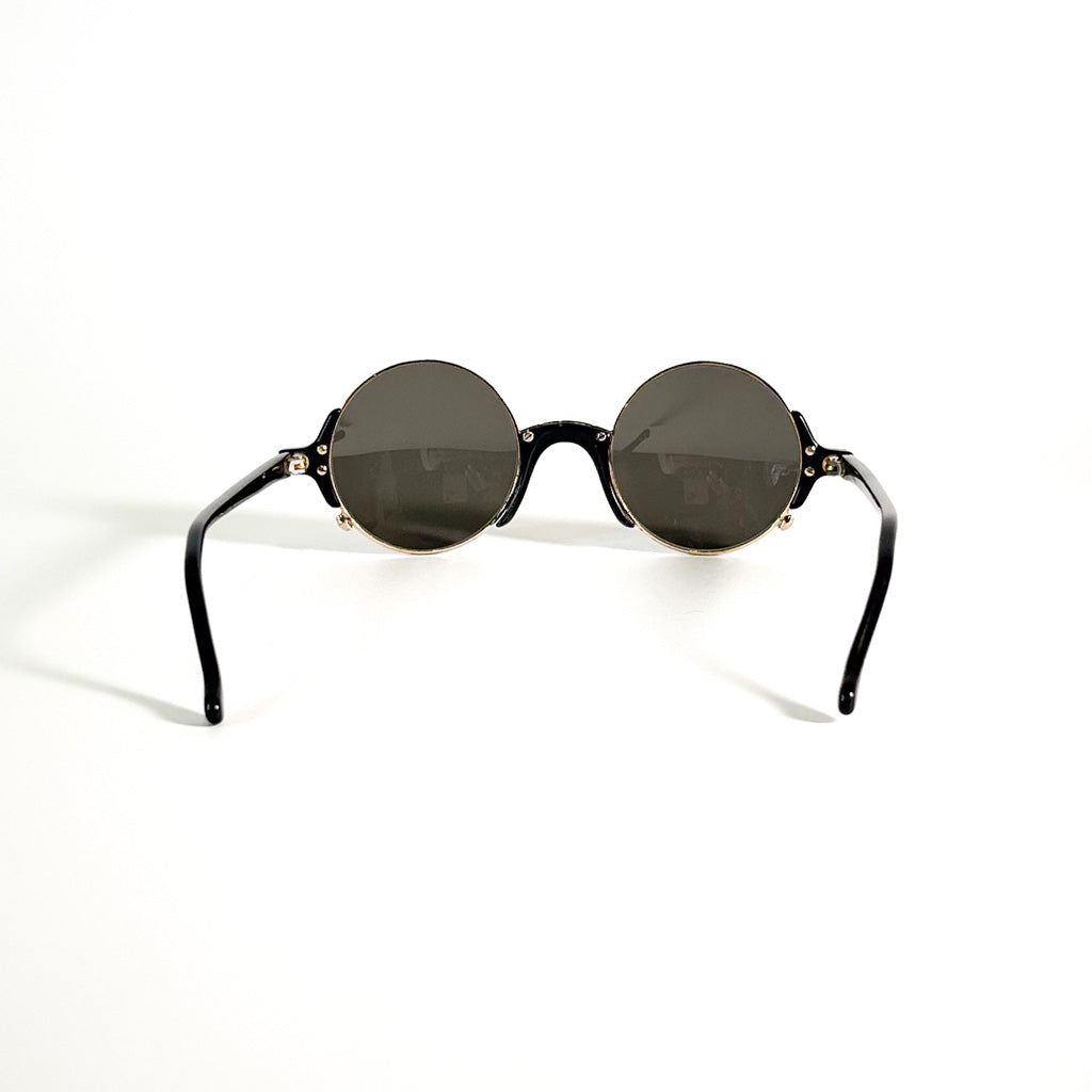 Monture Giorgio Armani noire et dorée forme ronde avec verres teintés gris