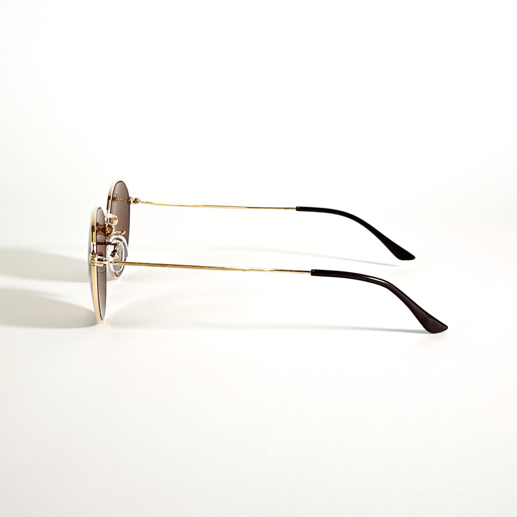 Lunettes vintage Morel vue de profil avec branches fines en métal doré et plaquage double or