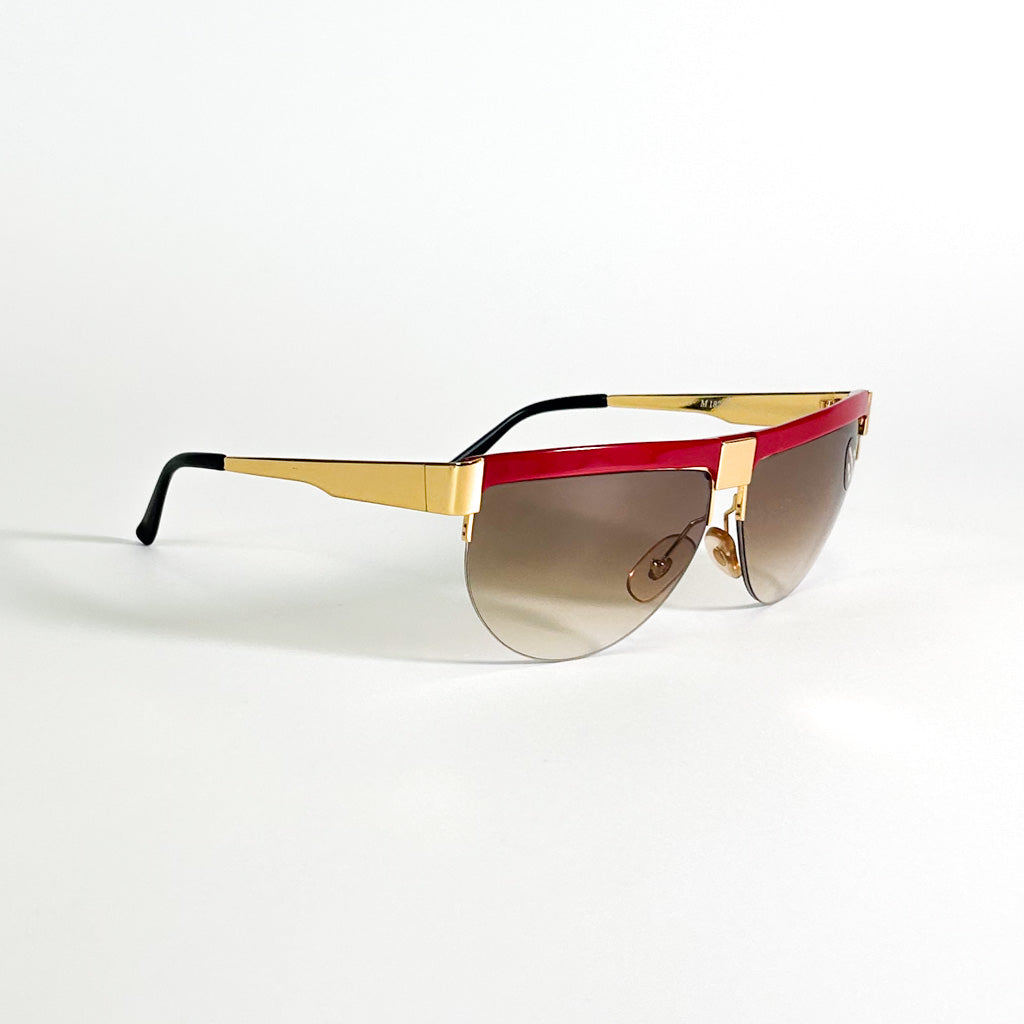 Détail monture Missoni M 187/S en métal doré et acétate rouge vue de profil