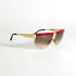 Détail monture Missoni M 187/S en métal doré et acétate rouge vue de profil