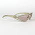 Vue de profil d’une monture Moschino vintage beige translucide sur fond blanc
