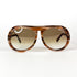 Modèle portant les Luxottica 9409, style rétro-chic