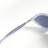 Lunettes vintage Silhouette 90s violet métallique portées par un modèle
