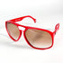 Vue trois-quarts des lunettes Guy Laroche rouges – pont ajouré