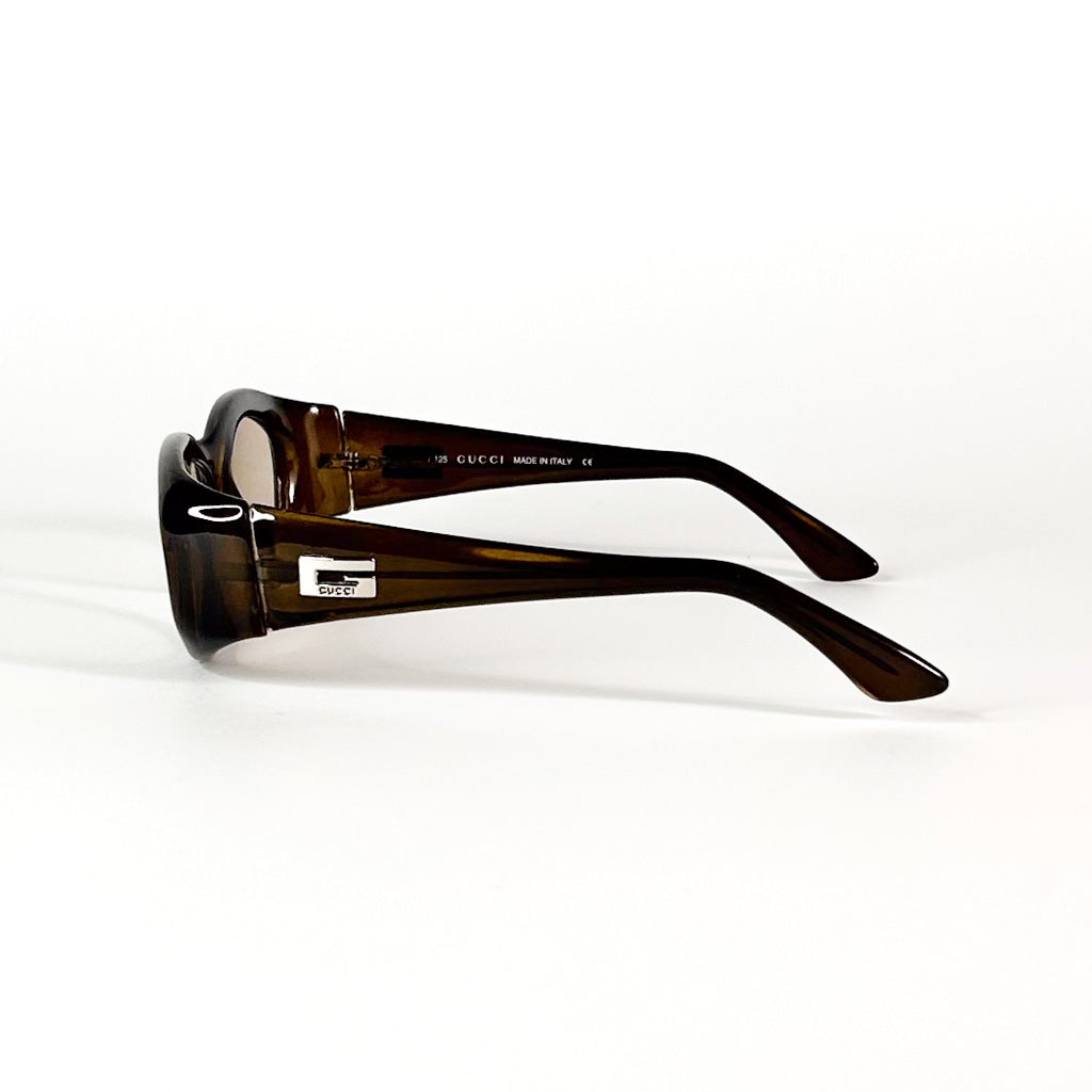 Profil droit des lunettes Gucci vintage en acétate marron translucide